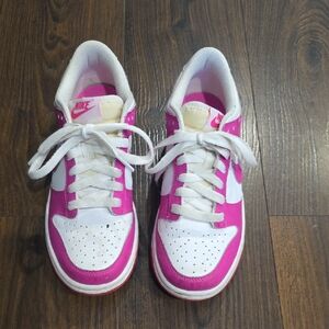 Nike Fuchsia and White Dunks size 4.5Y in great condition.